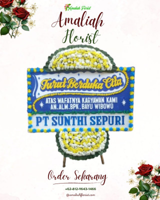 Papan Bunga Duka di Bahu